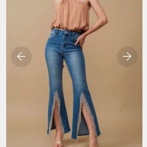 Jeans with flair and rhinestones down knee of legs